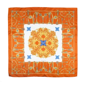 foulard in seta arancio con motivi nautici dorati e dettagli azzurri steso aperto