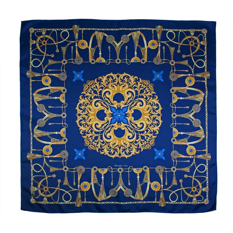 foulard in seta blu royal con decorazioni oro e dettagli azzurri steso aperto