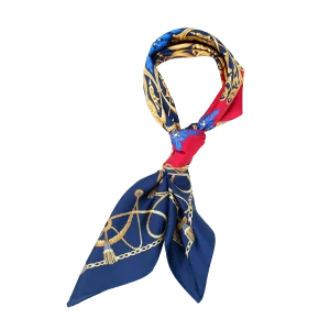 foulard in seta annodato blu navy e rosso con motivi nautici dorati