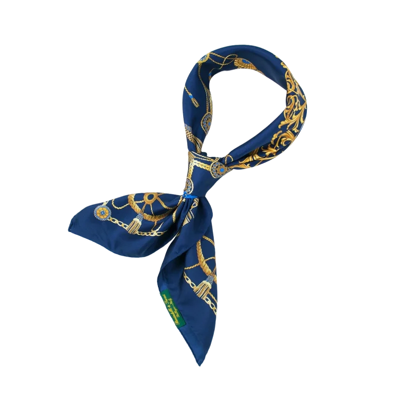 foulard in seta blu royal annodato con decorazioni nautiche dorate
