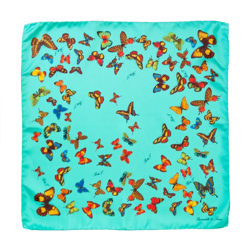 Foulard piccolo quadrato in seta azzurro acqua con fantasia a farfalle multicolore