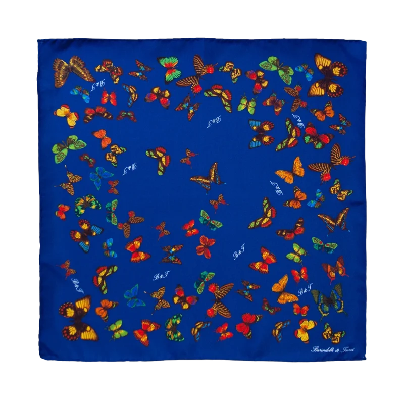 Foulard piccolo quadrato in seta blu notte con fantasia a farfalle multicolore
