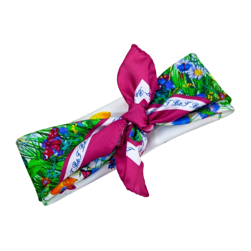 Foulard piccolo da donna in seta color ciliegia con fantasia floreale e farfalle annodato
