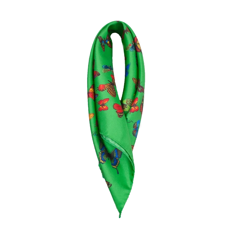 Foulard piccolo in seta verde smeraldo con fantasia a farfalle multicolore piegato