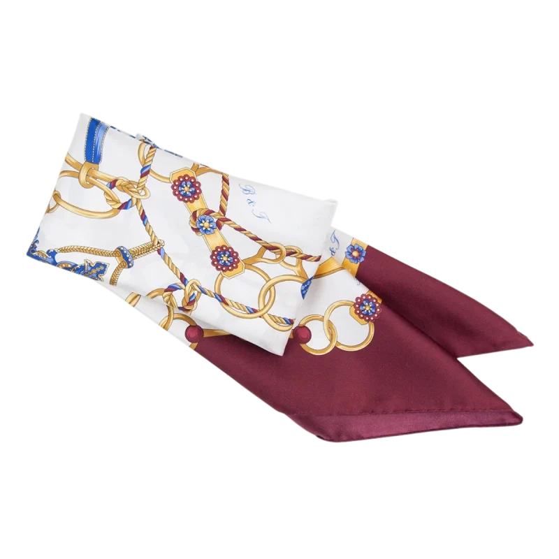 foulard da donna in seta bordeaux annodato con fantasia blu e oro