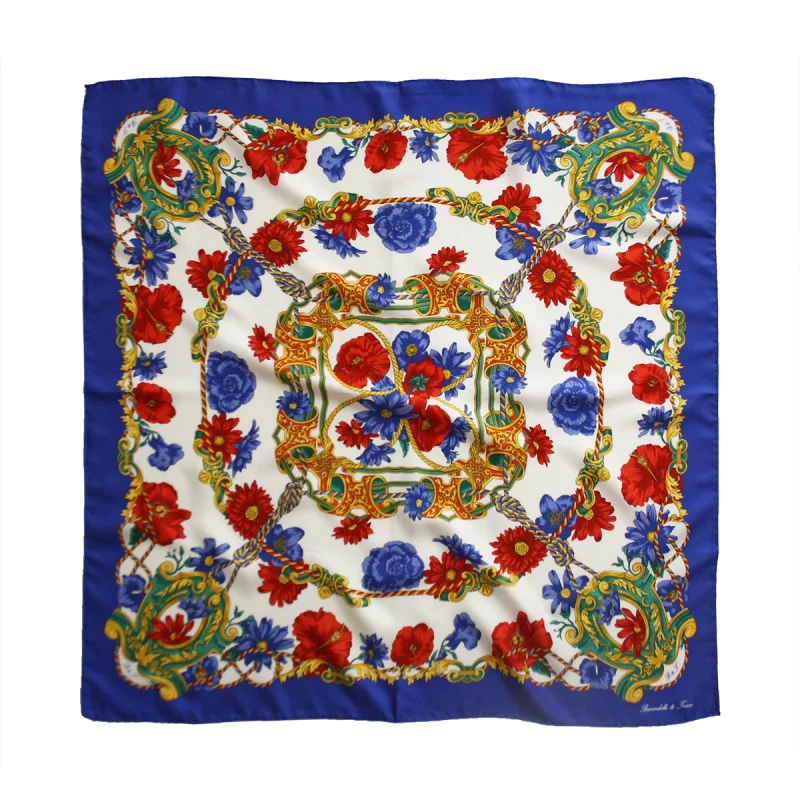 foulard 90x90 in seta con bordo blu royal e fantasia floreale rossa blu e verde