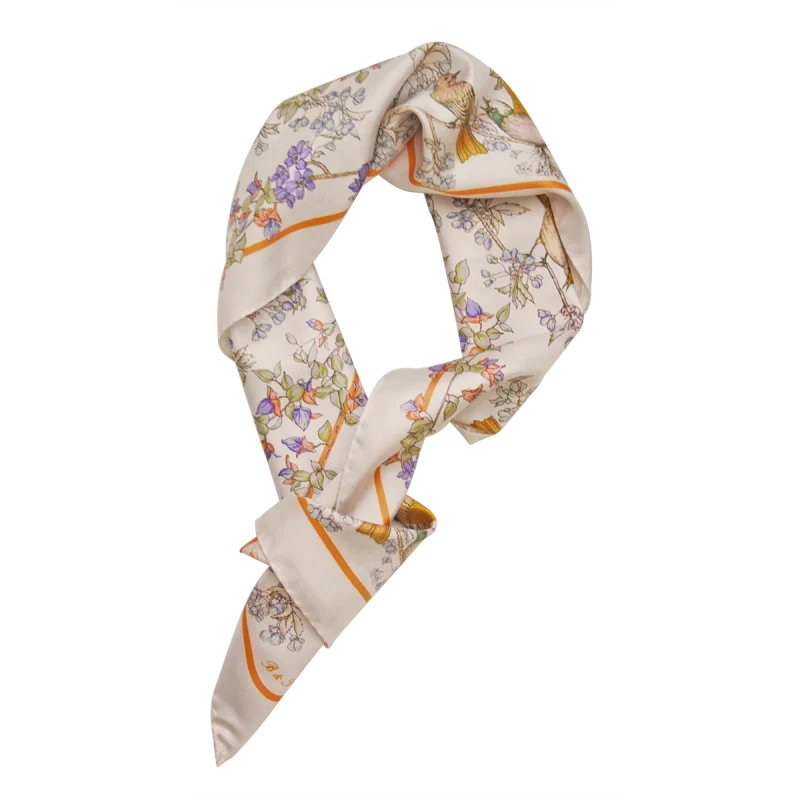foulard da donna in seta annodato con fiori lilla e dettagli arancio