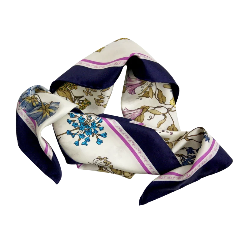 foulard da donna in seta piegato con fiori azzurri lilla e gialli