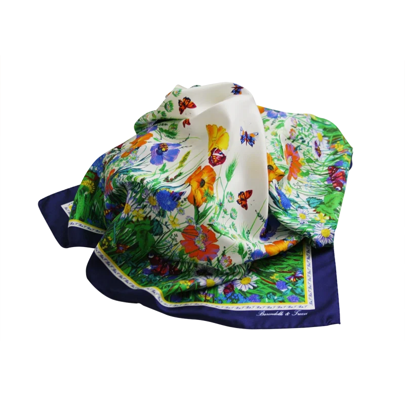 foulard in seta drappeggiato con fiori colorati, farfalle e bordo blu notte