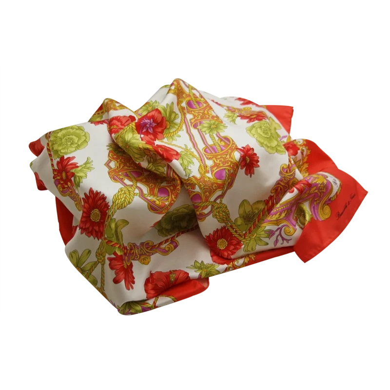 foulard in seta corallo e verde drappeggiato con fantasia floreale