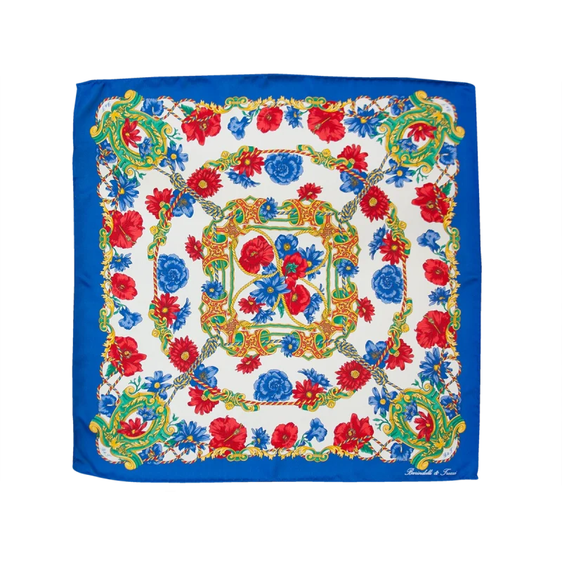 Foulard piccolo in seta blu rosso con fantasia floreale disteso
