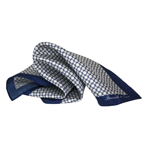 Pochette da taschino uomo in seta twill con fantasia geometrica bianca e blu navy